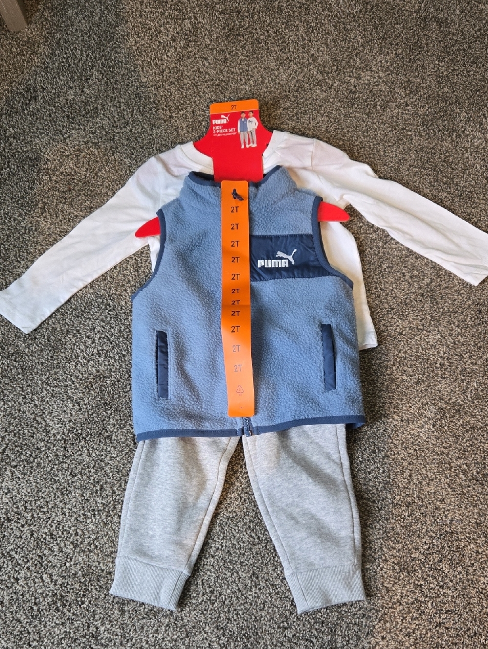 Puma Light Blue Fleece Vest with White Top and Gray Joggers